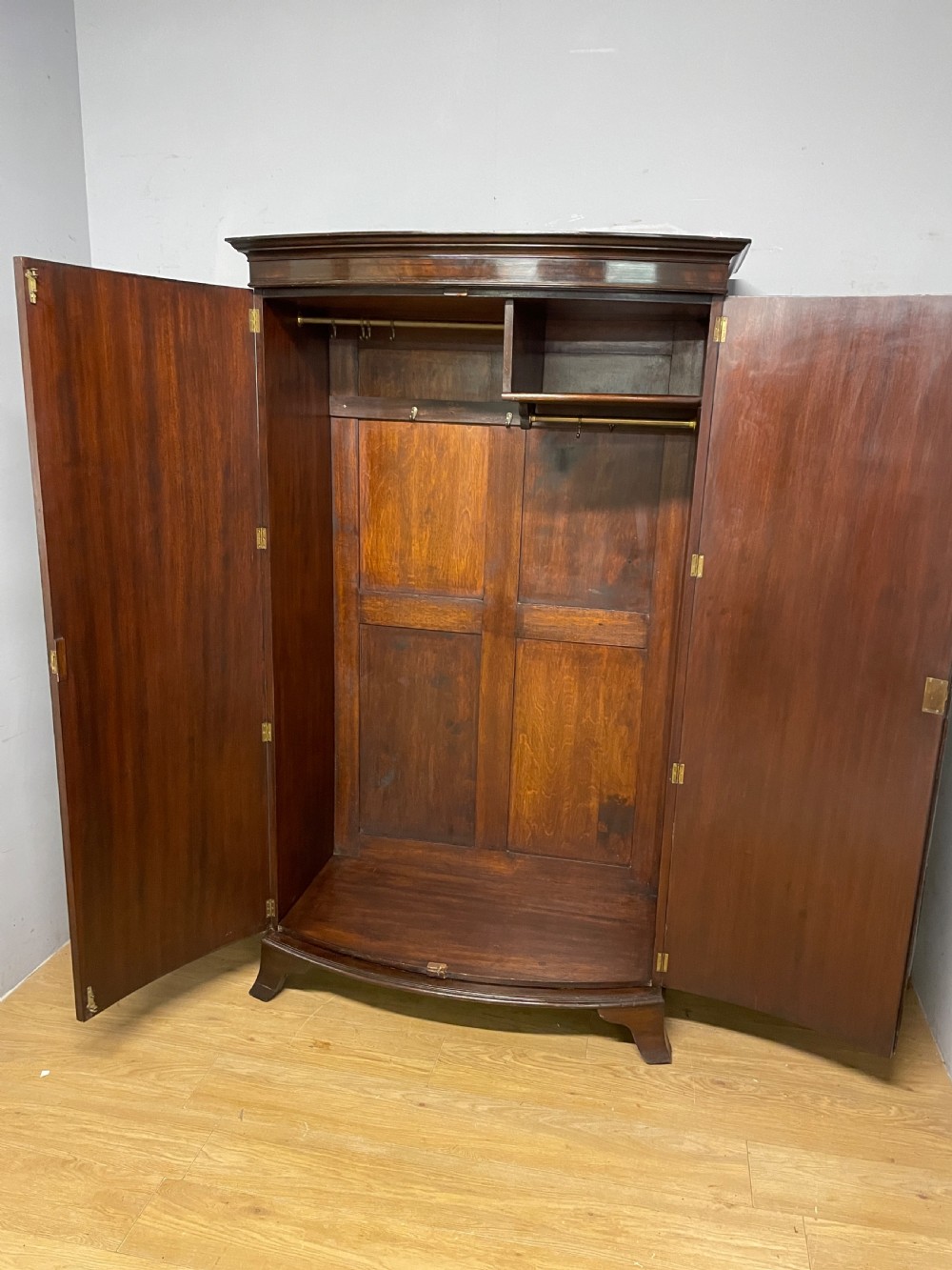 C19TH bow front flame mahogany wardrobe  View V