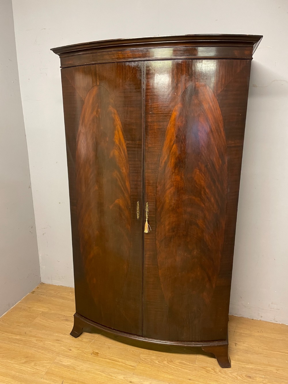 C19TH bow front flame mahogany wardrobe  View XII
