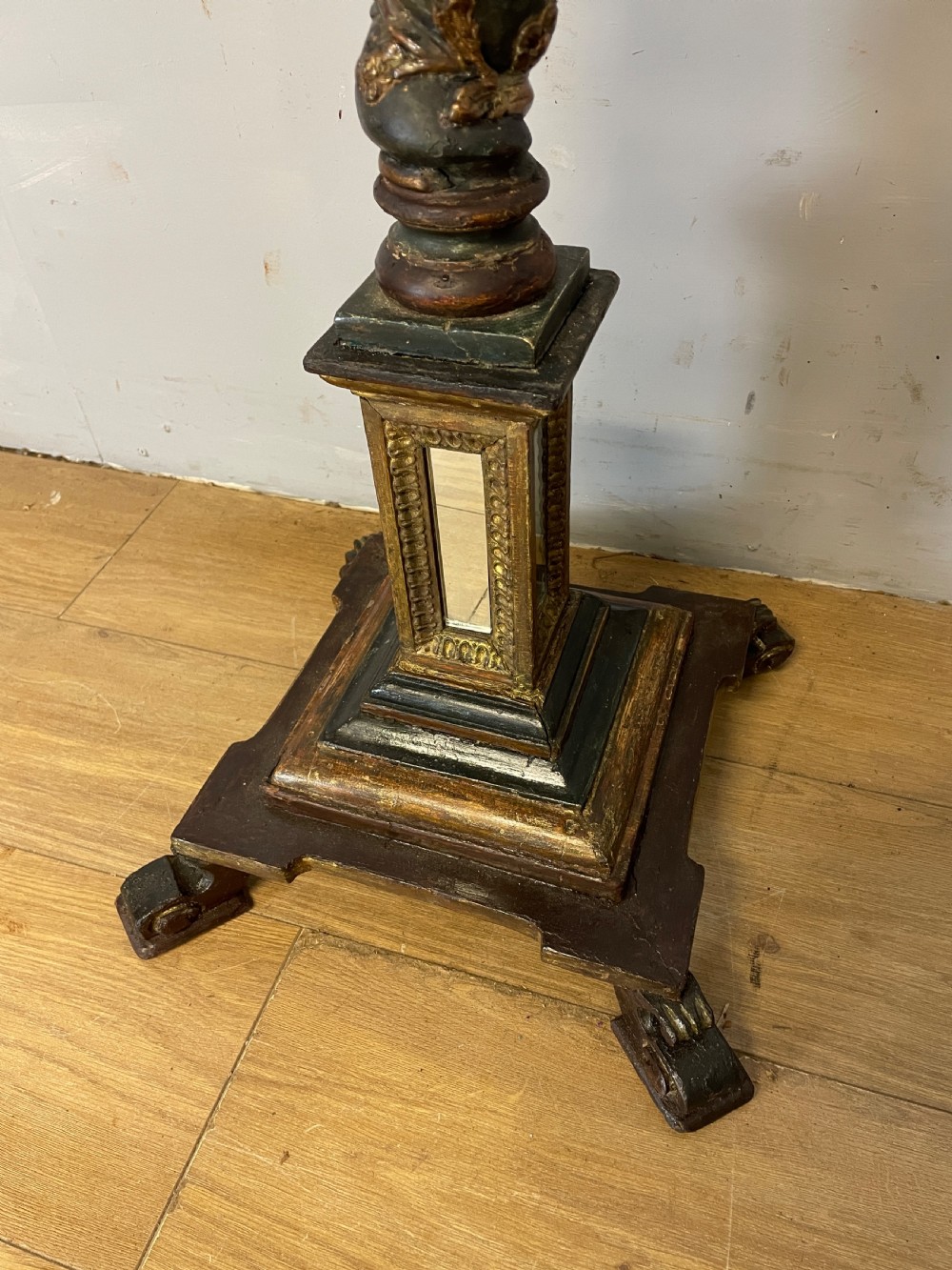 An 18th-century Italian carved wood torchere with a gilded Corinthian capital, fluted column, spiral twist shaft, and stepped base with scroll feet. View III