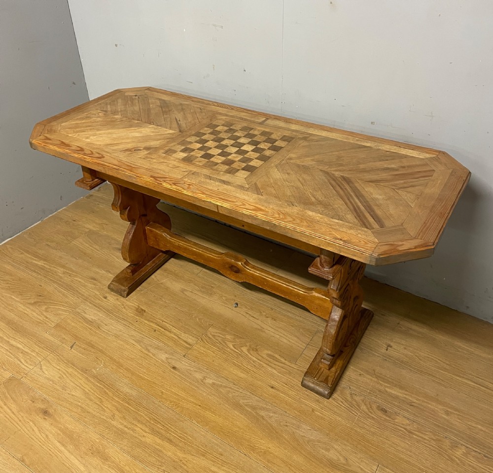 Arts and Crafts parquetry and carved  pine table with central chess board top