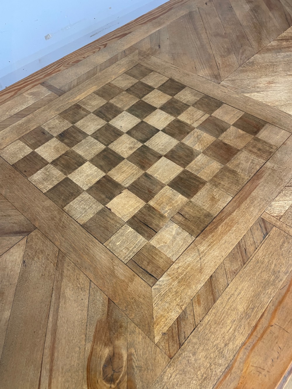 Arts and Crafts parquetry and carved  pine table with central chess board top View VIII