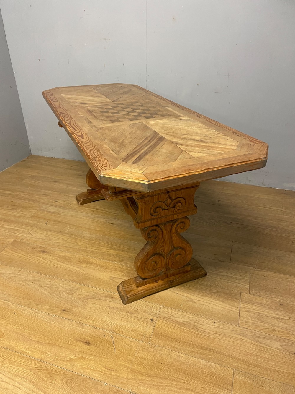 Arts and Crafts parquetry and carved  pine table with central chess board top View IX
