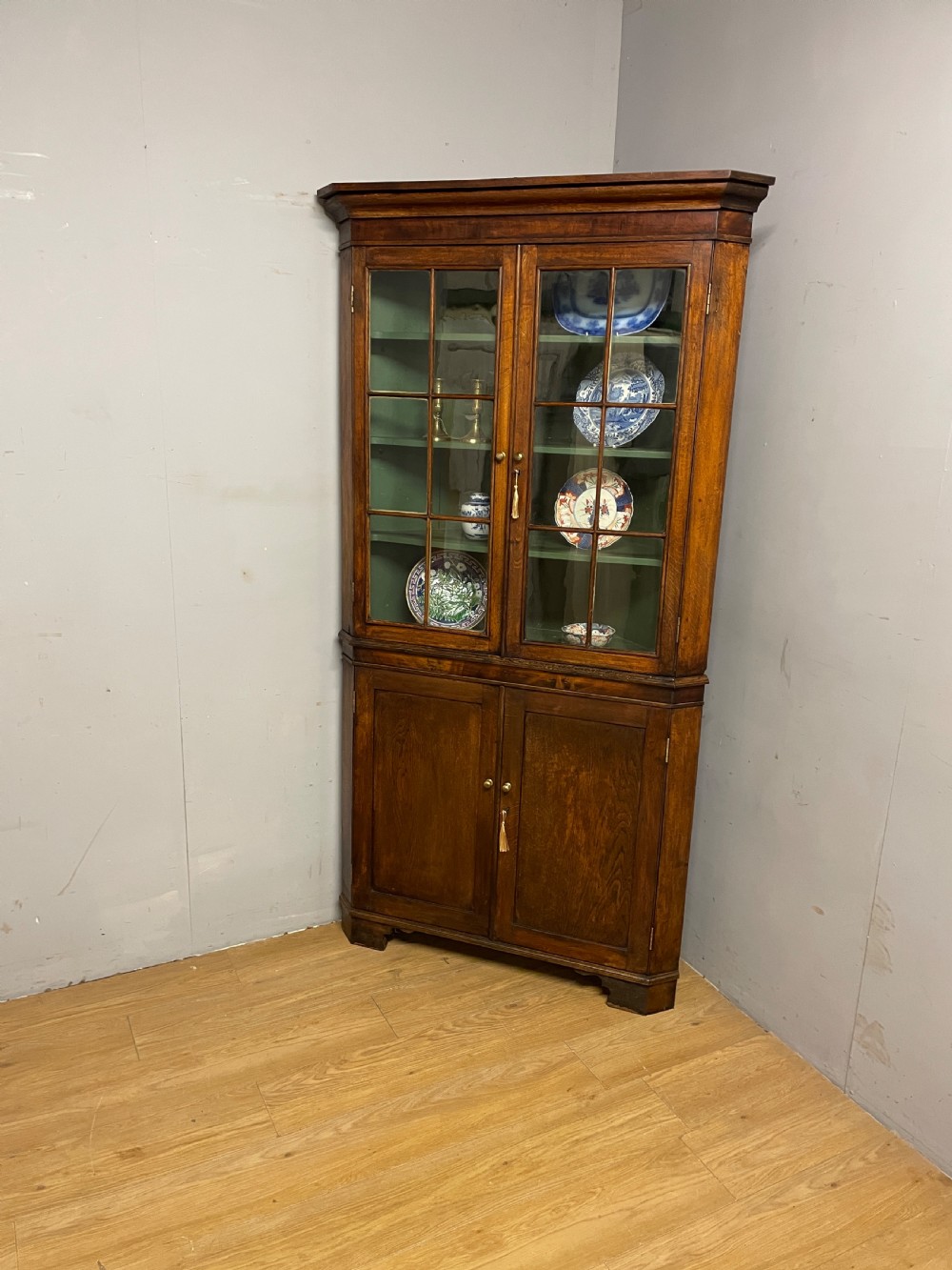 Georgian oak freestanding glazed corner cupboard circa 1790 View VIII