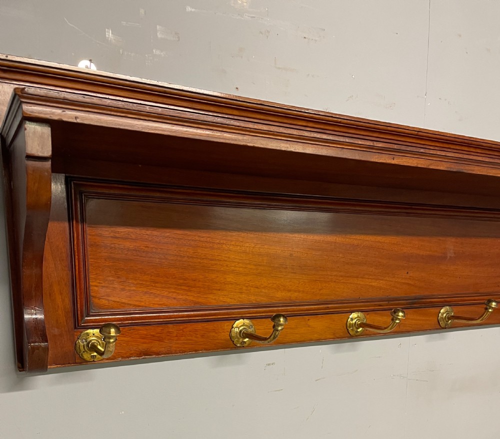 Arts and crafts walnut portmanteau style coat hooks  View IV