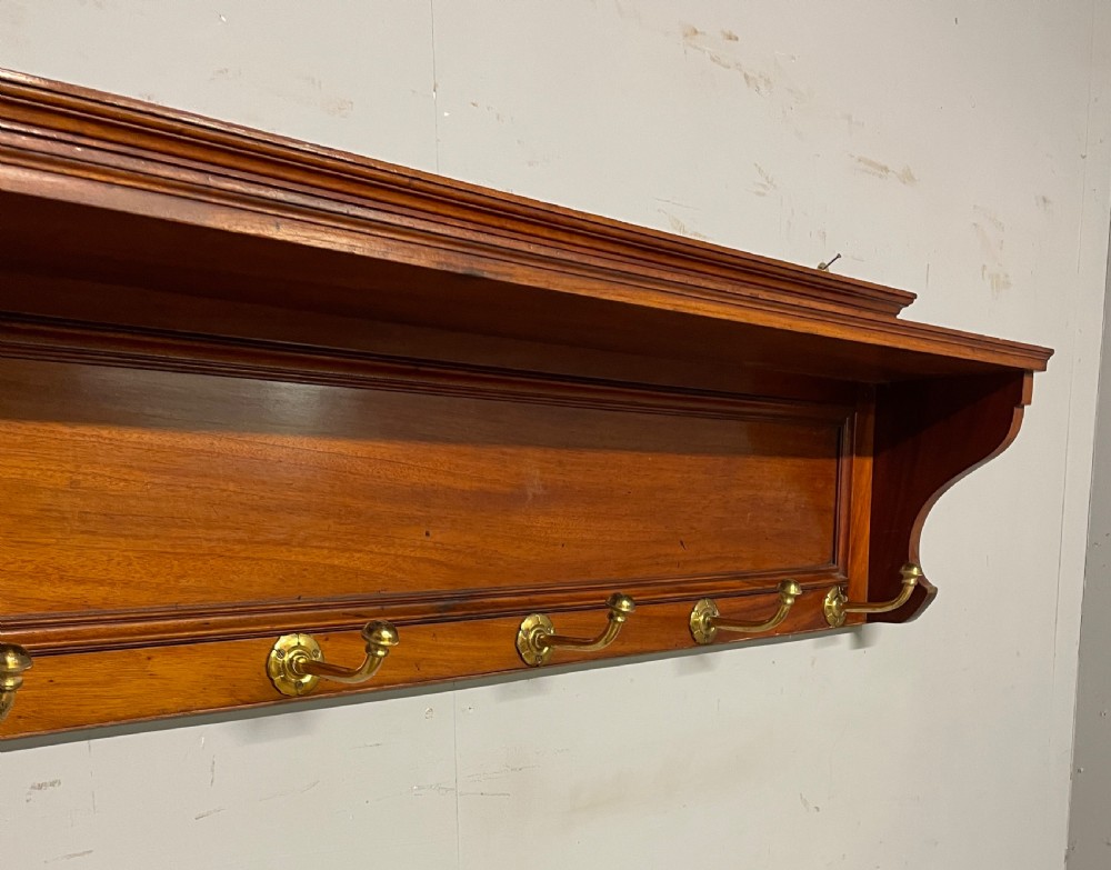 Arts and crafts walnut portmanteau style coat hooks  View V
