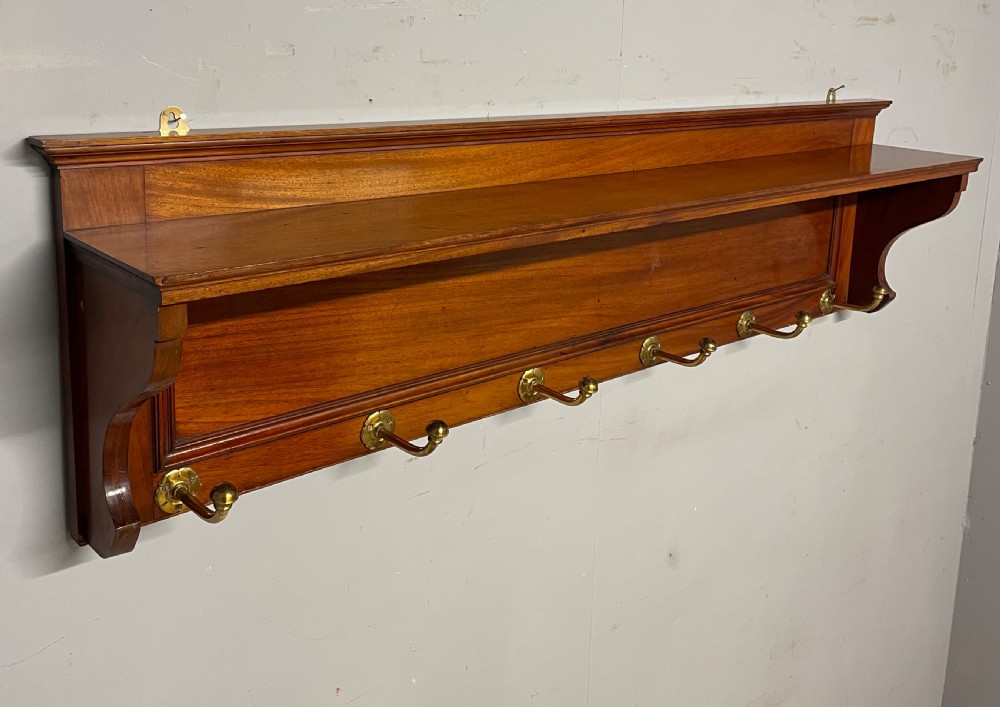 Arts and crafts walnut portmanteau style coat hooks  View VII