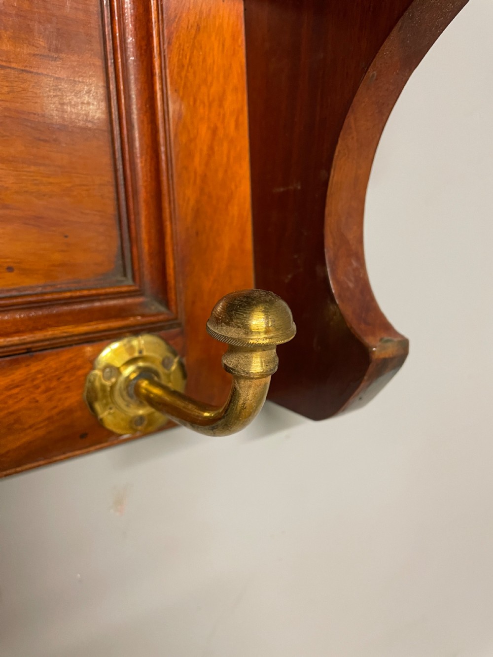 Arts and crafts walnut portmanteau style coat hooks  View IX