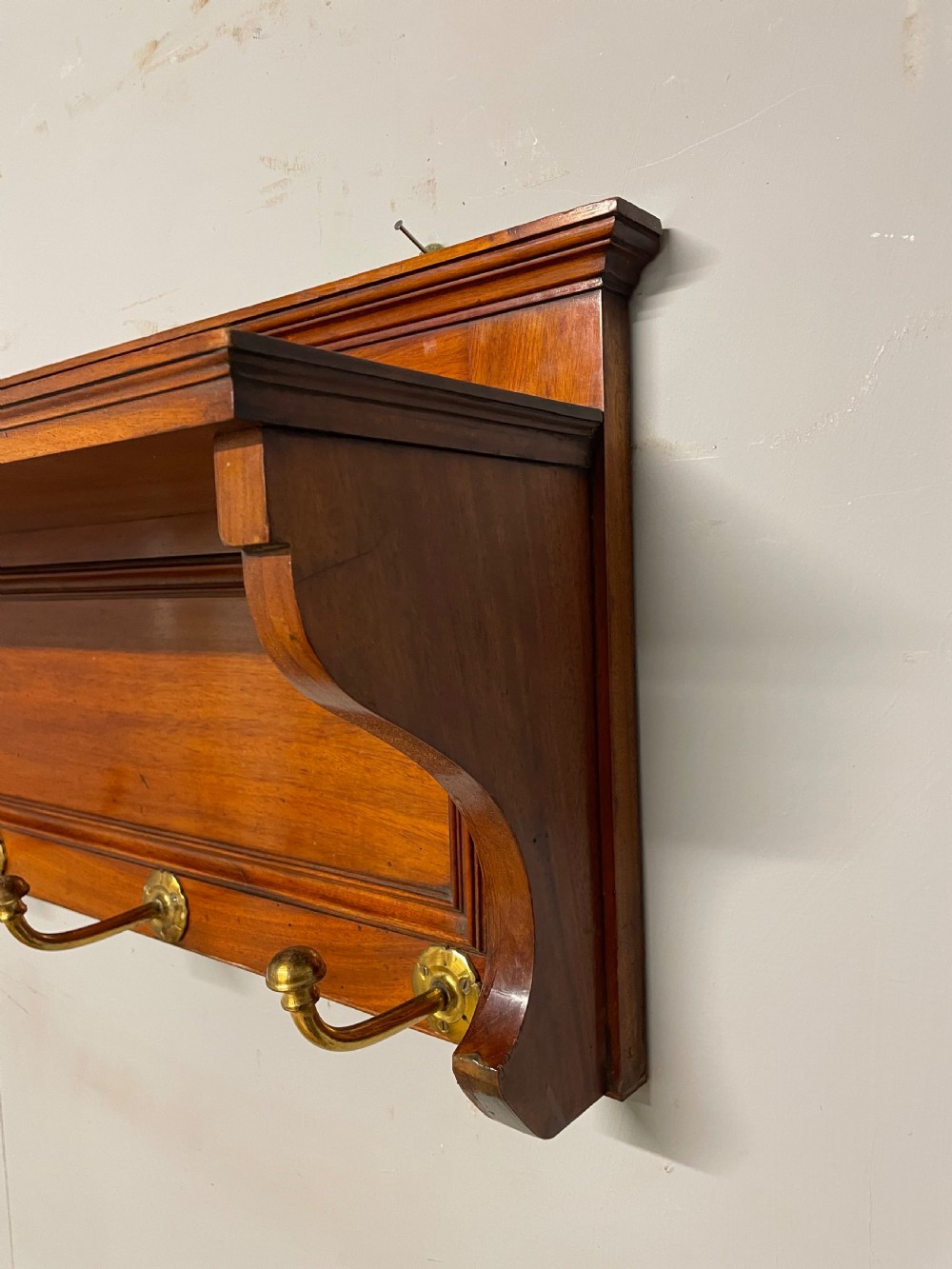 Arts and crafts walnut portmanteau style coat hooks  View X