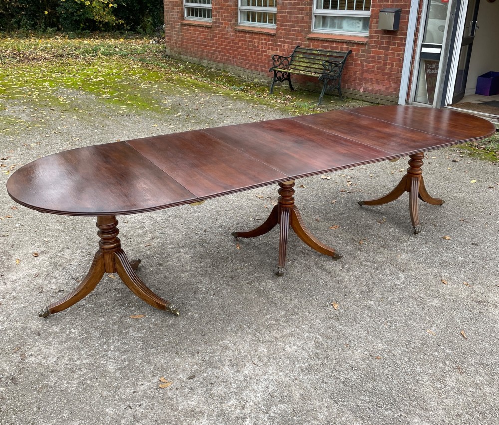 Edwardian solid mahogany three pillar ten foot dining table