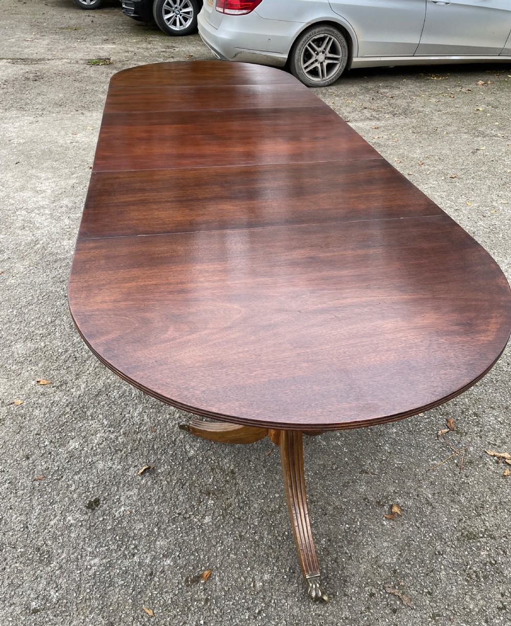Edwardian solid mahogany three pillar ten foot dining table View II
