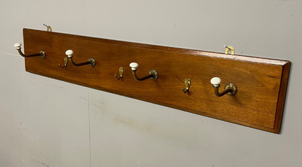 Brass and porcelain coat rack circa 1895  View II