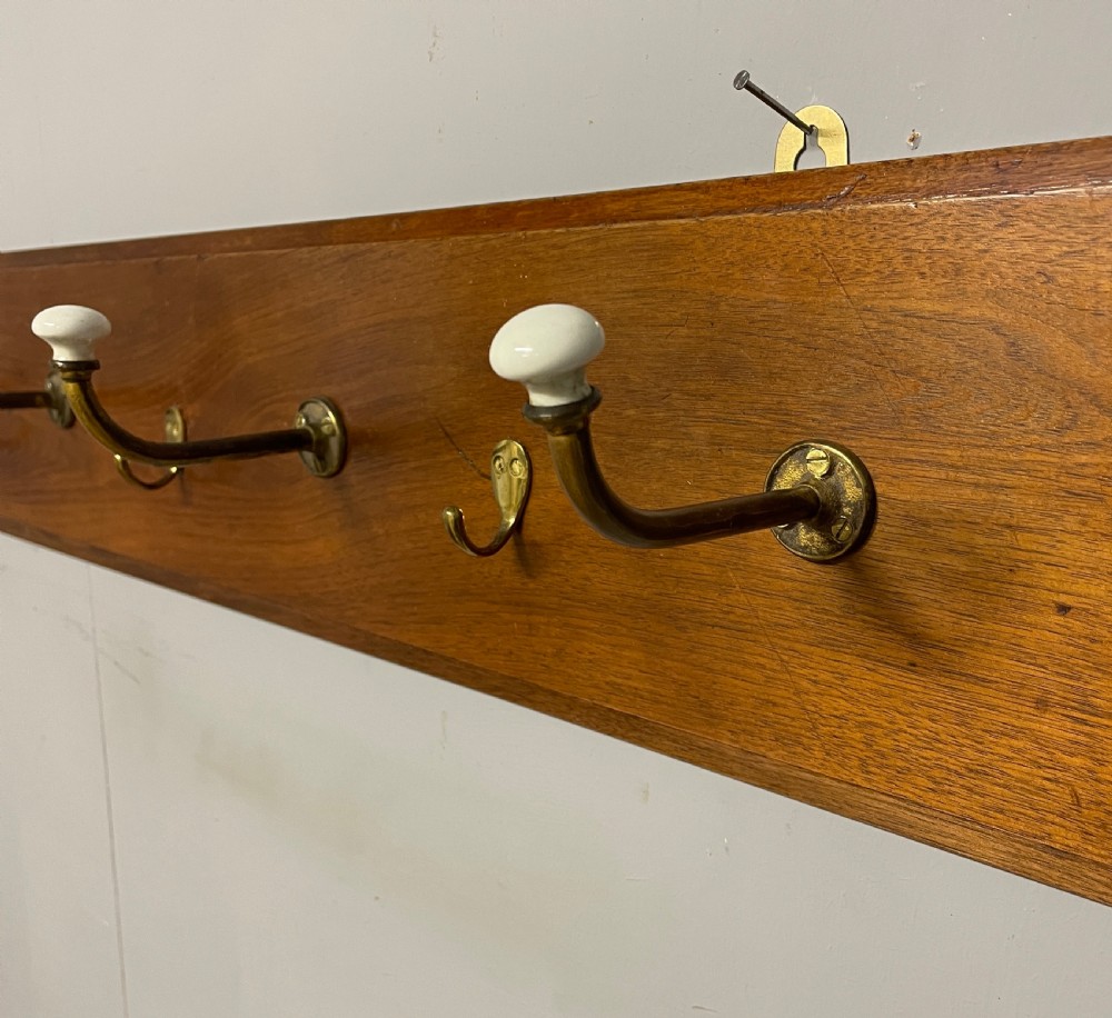 Brass and porcelain coat rack circa 1895  View III