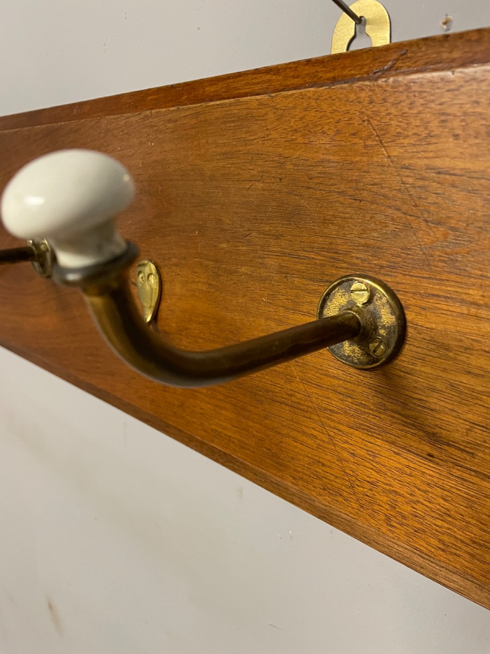 Brass and porcelain coat rack circa 1895  View IV
