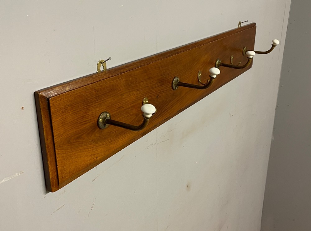 Brass and porcelain coat rack circa 1895  View VII
