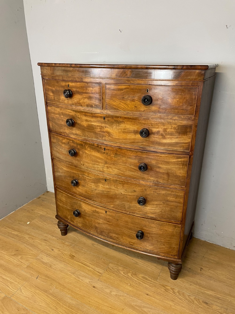 C19TH five height flame mahogany bow front chest of drawers 
