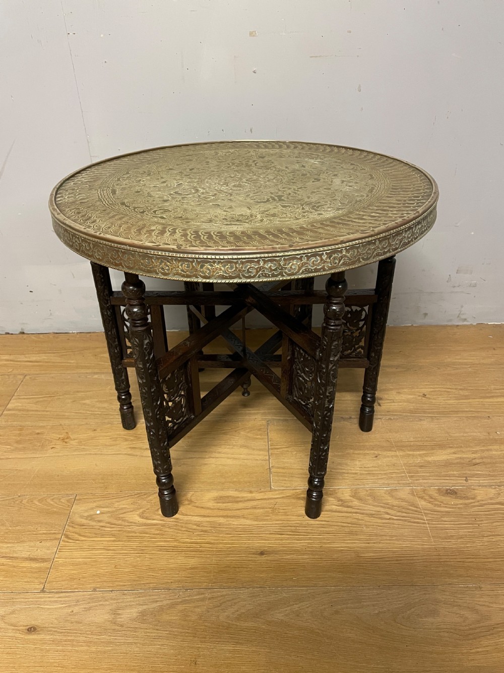 Indian brass and carved hardwood folding table circa 1920