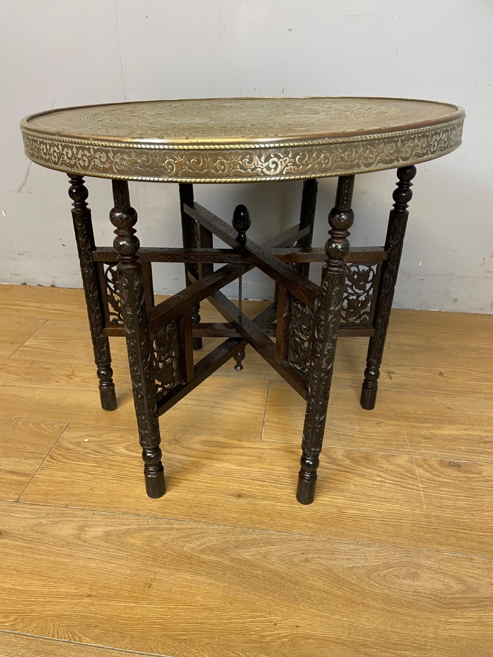 Indian brass and carved hardwood folding table circa 1920 View X