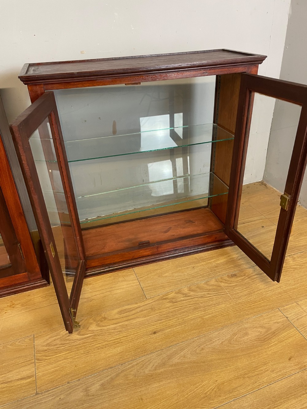 Pair of Edwardian mahogany counter top display cabinets  View III
