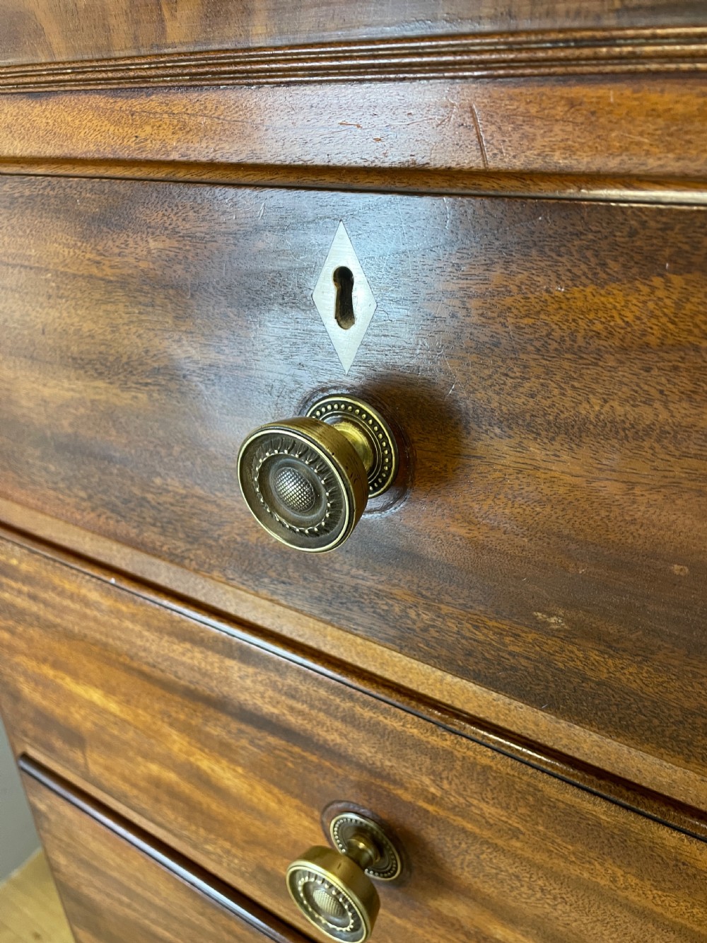 Late Regency five height mahogany chest of drawers with provenance  View V