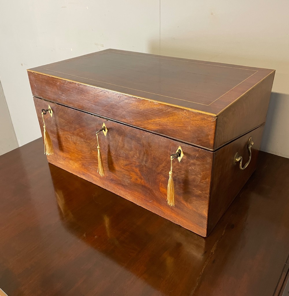 Unusual large mid C19TH flame mahogany writing slope 