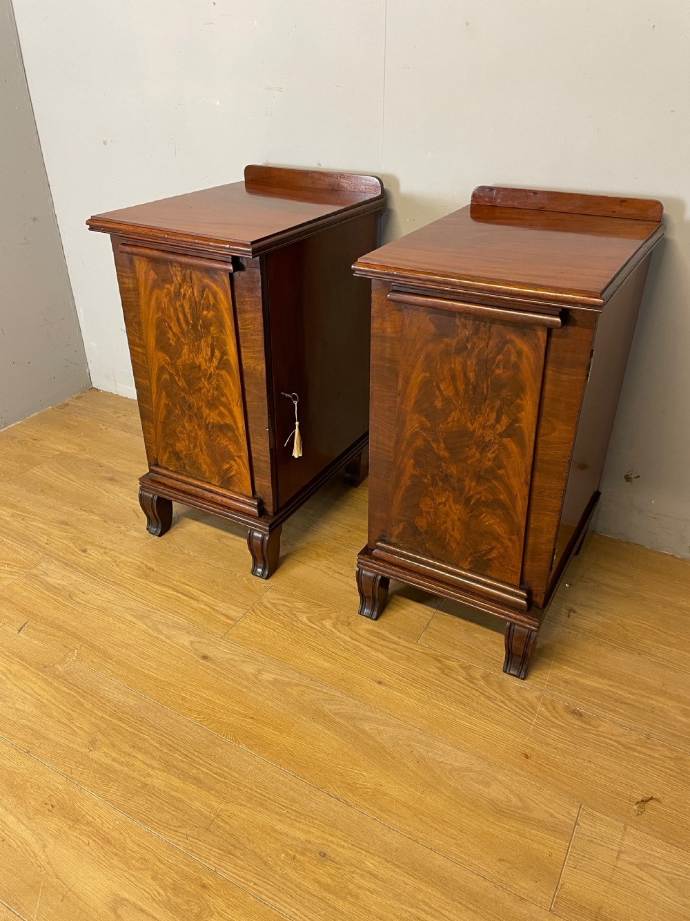 Pair of Regency flame mahogany bedside cabinets View II