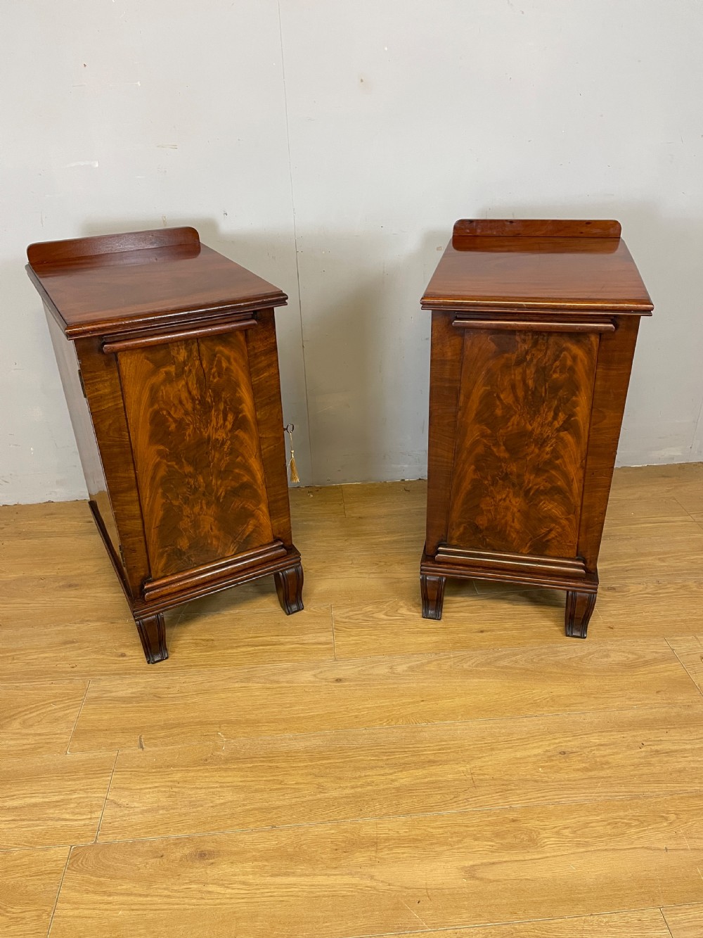 Pair of Regency flame mahogany bedside cabinets View XV