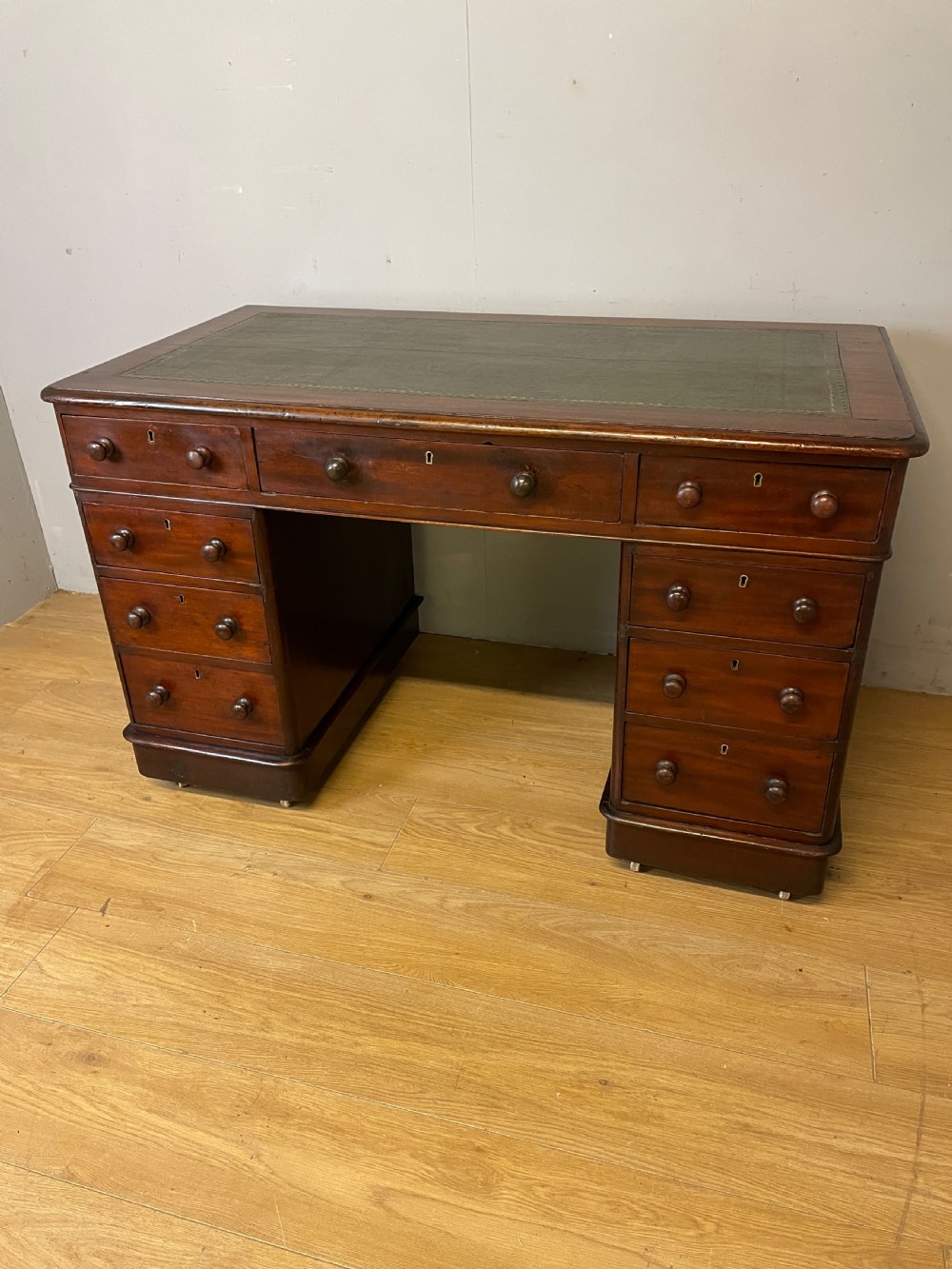 C19TH mahogany three part desk with inset green leather top