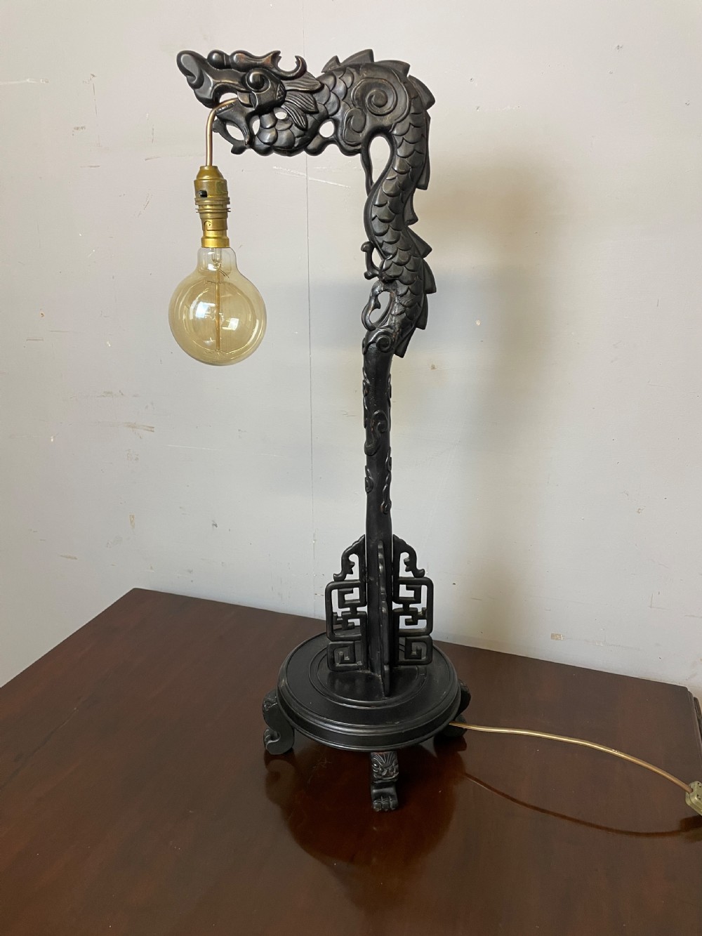 Early C20th carved oriental dragon light 