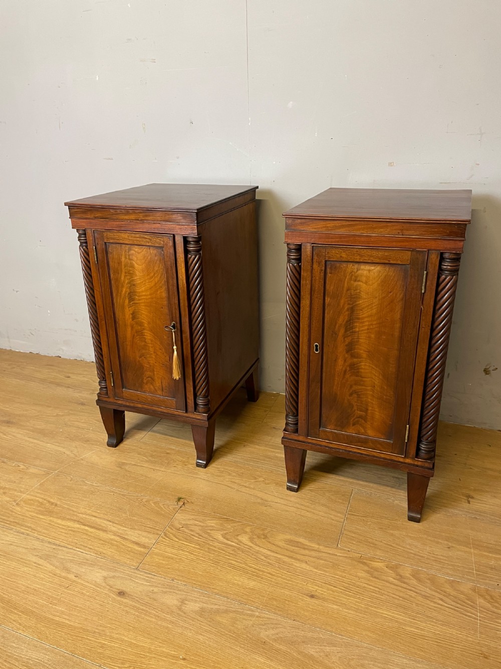 Pair of Regency flame mahogany bedside cabinets circa 1830 