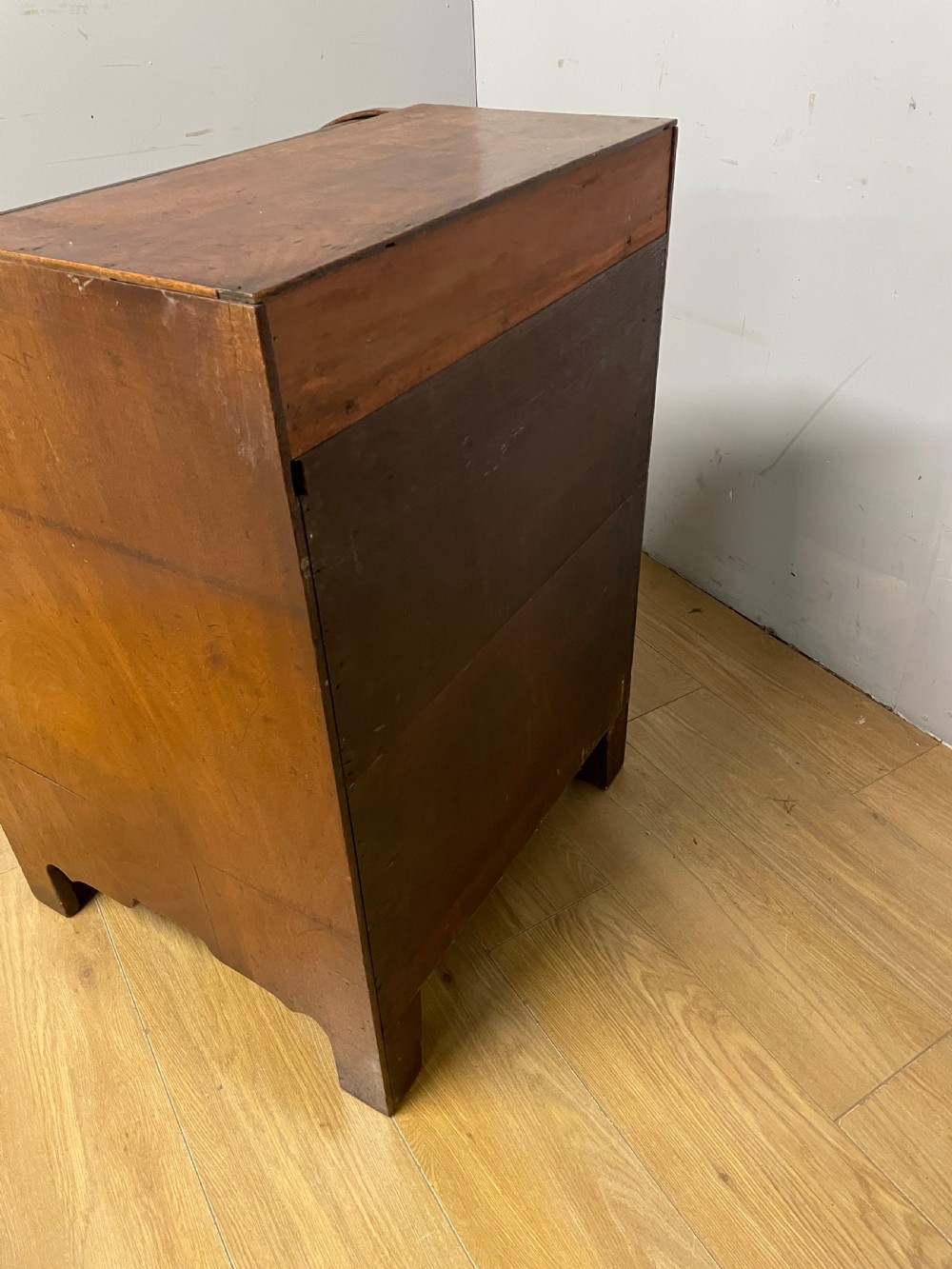 A Georgian mahogany bureau cabinet featuring a curved slatted tambour shutter above four small drawers and two wide drawers with brass handles. View XIX