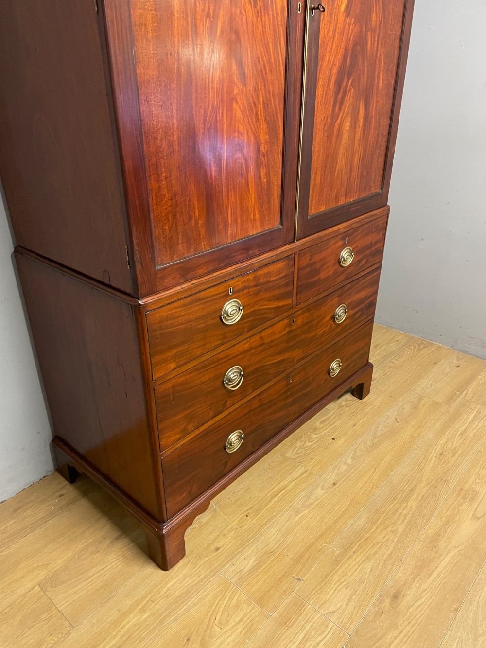 Georgian flame  mahogany linen press circa 1800  View IV