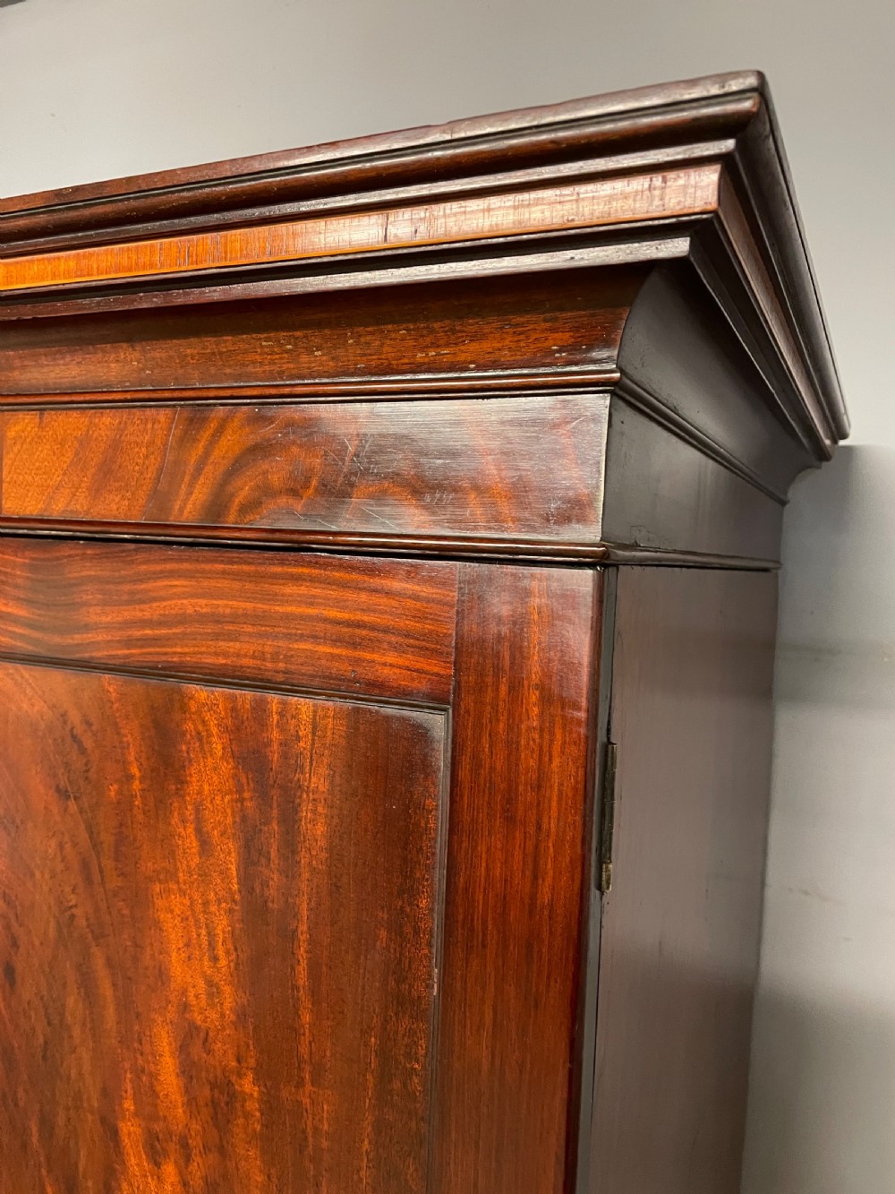 Georgian flame  mahogany linen press circa 1800  View IX
