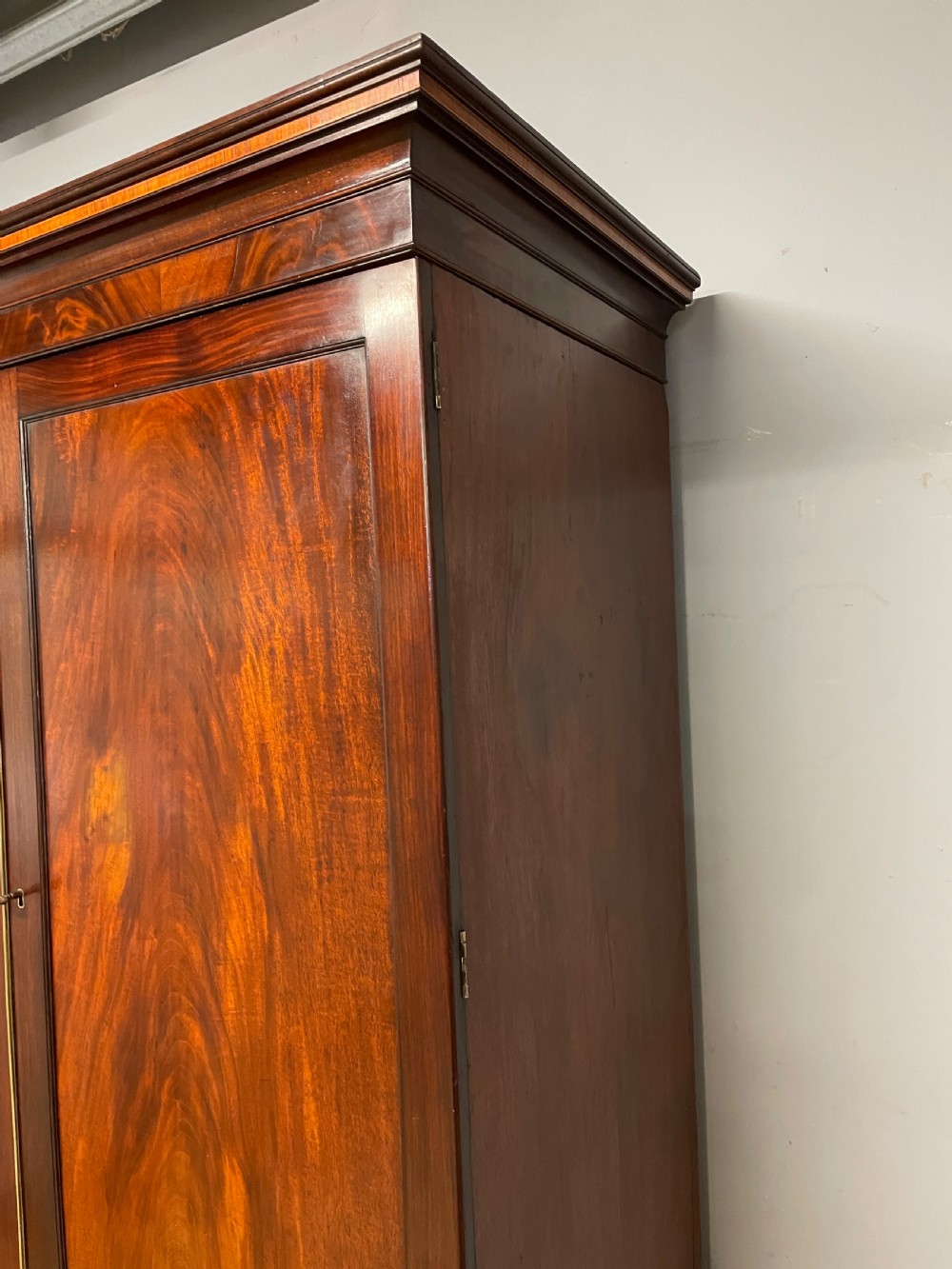 Georgian flame  mahogany linen press circa 1800  View X