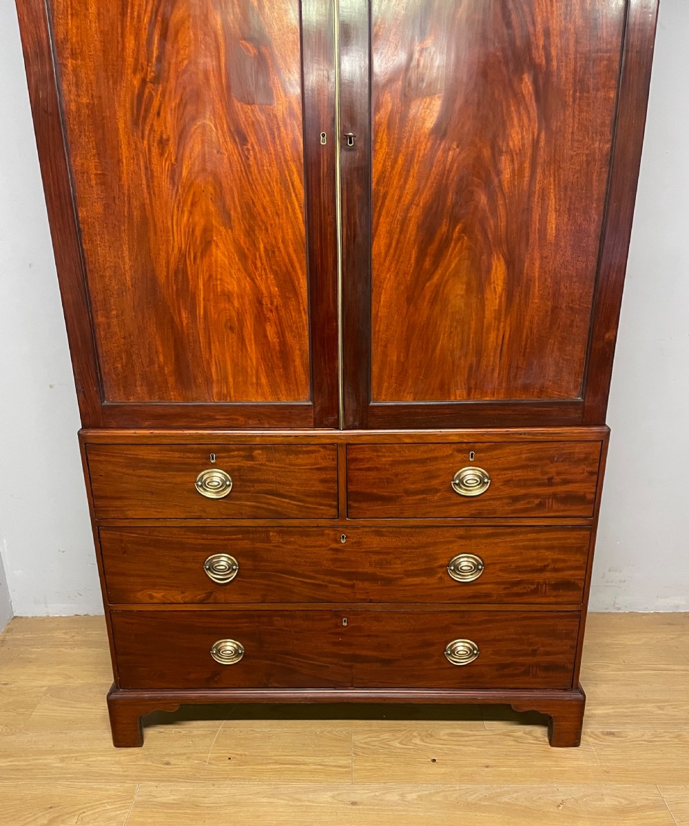 Georgian flame  mahogany linen press circa 1800  View XII