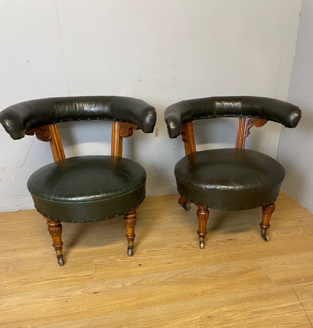 Near pair of C19th century golden oak framed green leather tub chairs  View II