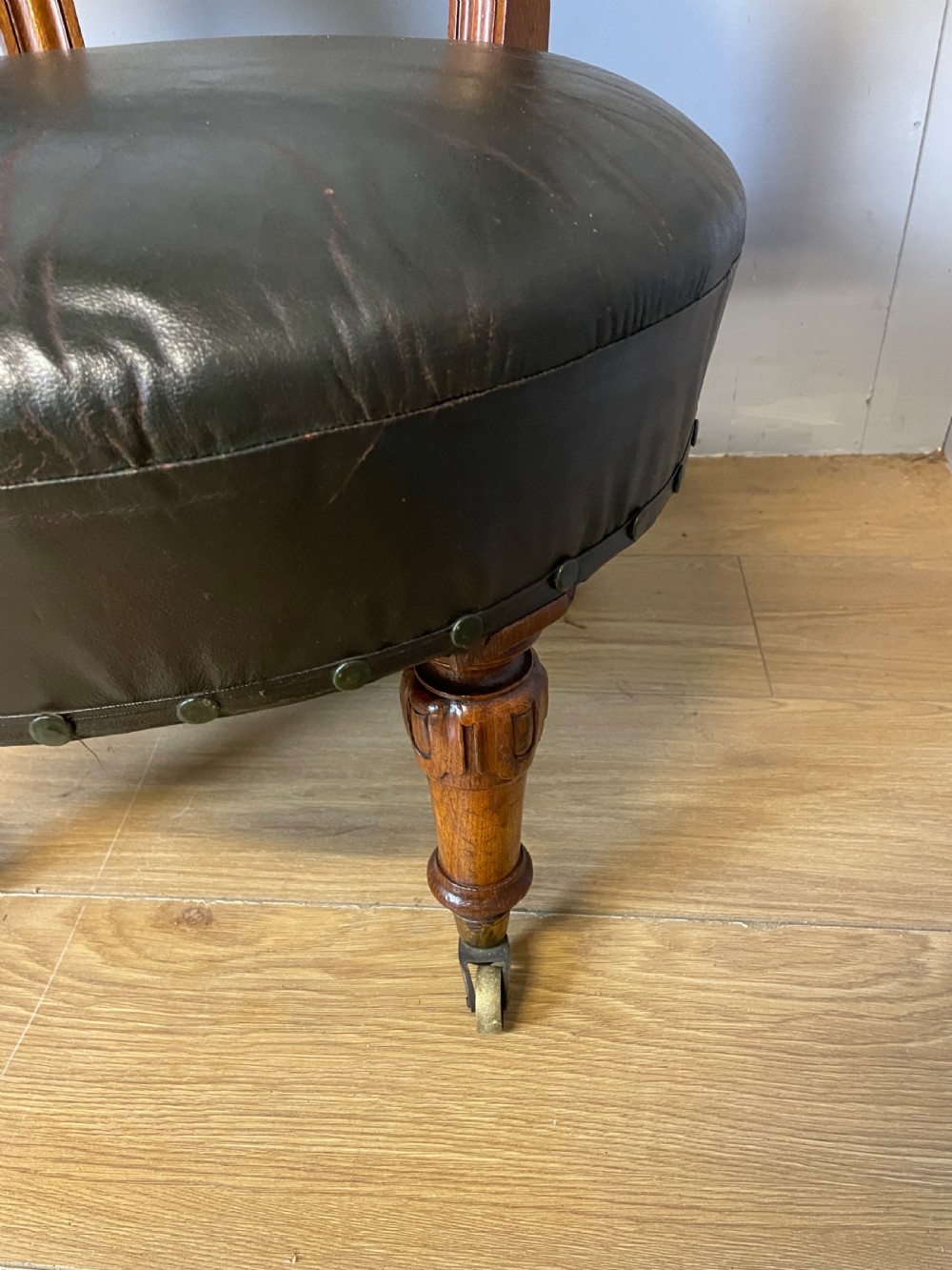 Near pair of C19th century golden oak framed green leather tub chairs  View III