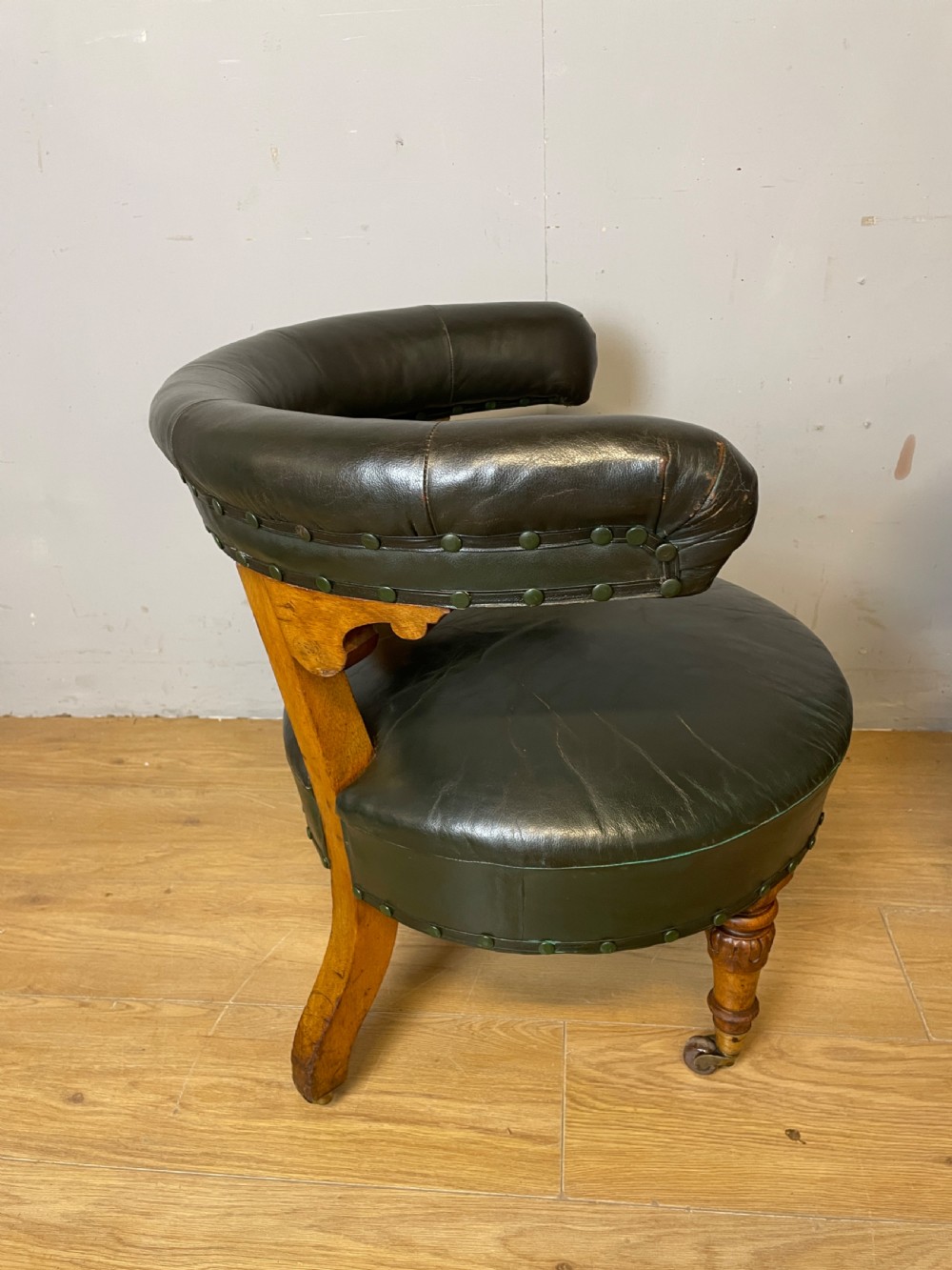 Near pair of C19th century golden oak framed green leather tub chairs  View V