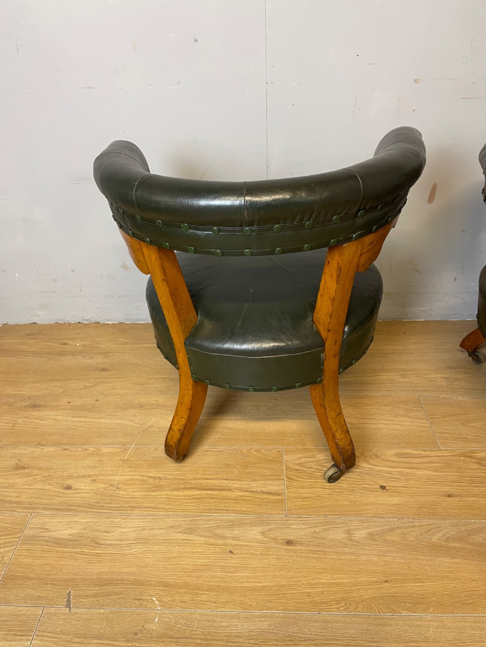 Near pair of C19th century golden oak framed green leather tub chairs  View VI