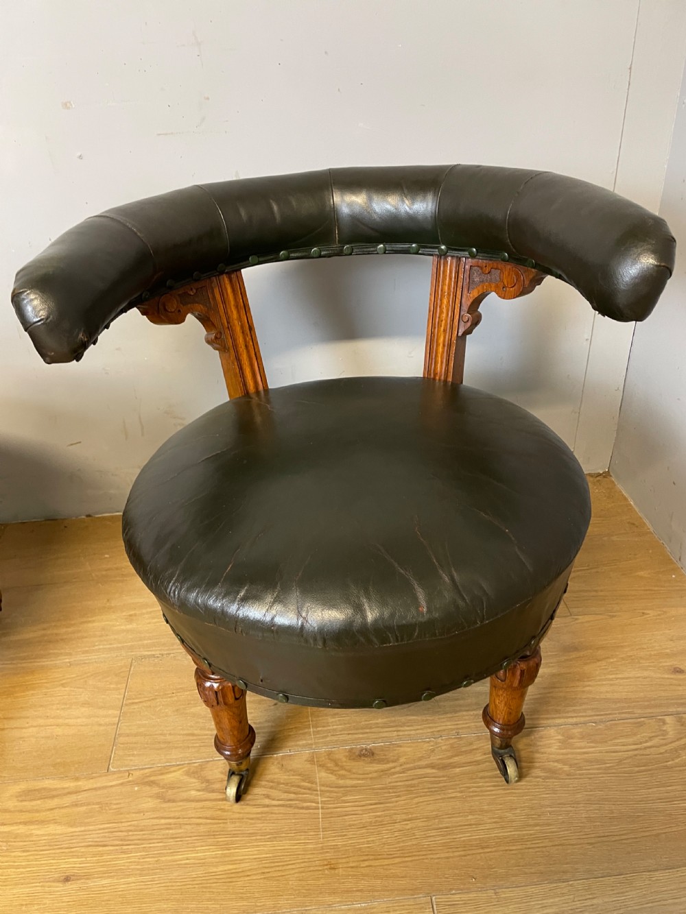 Near pair of C19th century golden oak framed green leather tub chairs  View VII