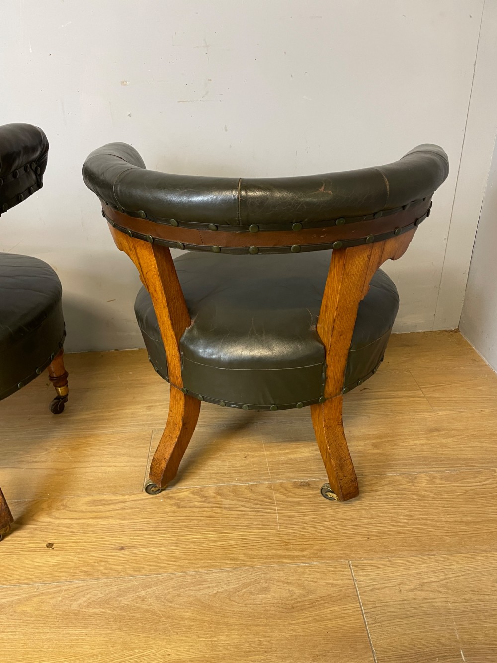 Near pair of C19th century golden oak framed green leather tub chairs  View VIII