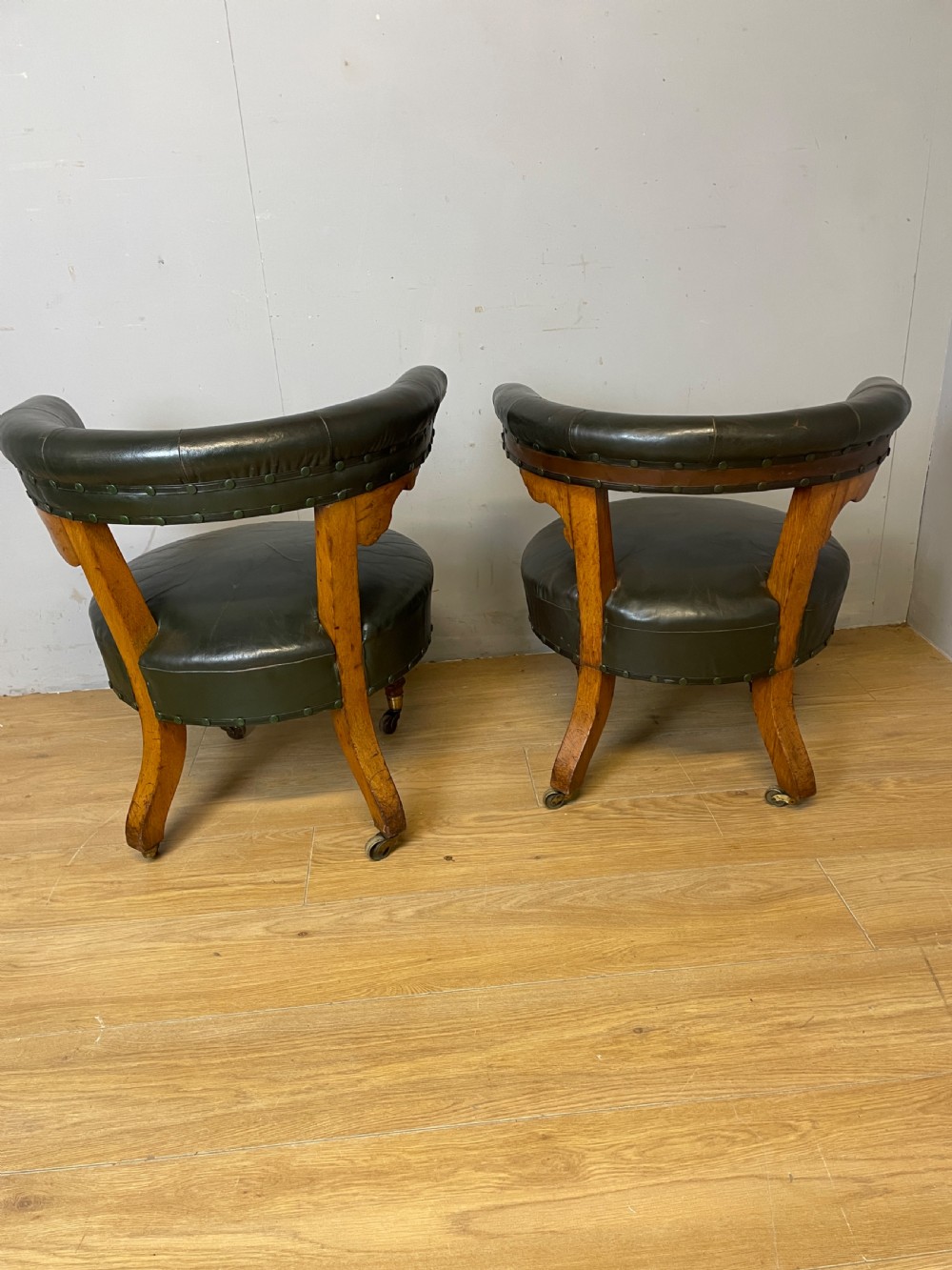 Near pair of C19th century golden oak framed green leather tub chairs  View IX