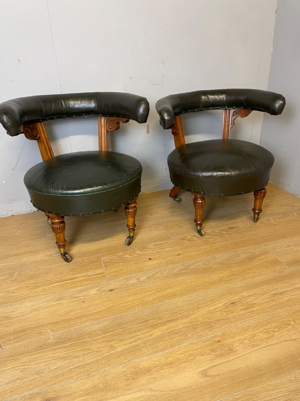 Near pair of C19th century golden oak framed green leather tub chairs  View XI