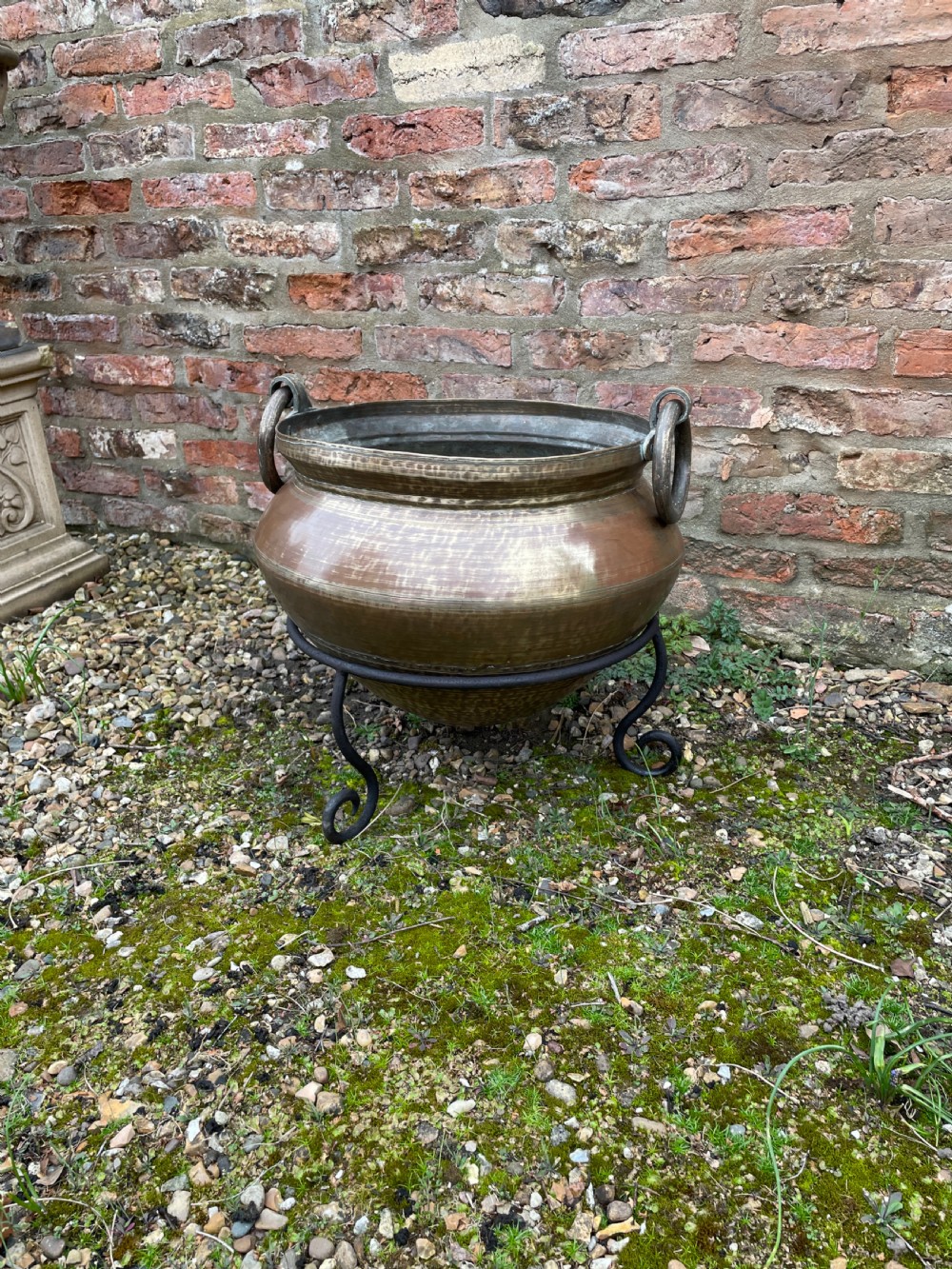 Oriental brass log bin on iron tripod stand circa 1920 View III