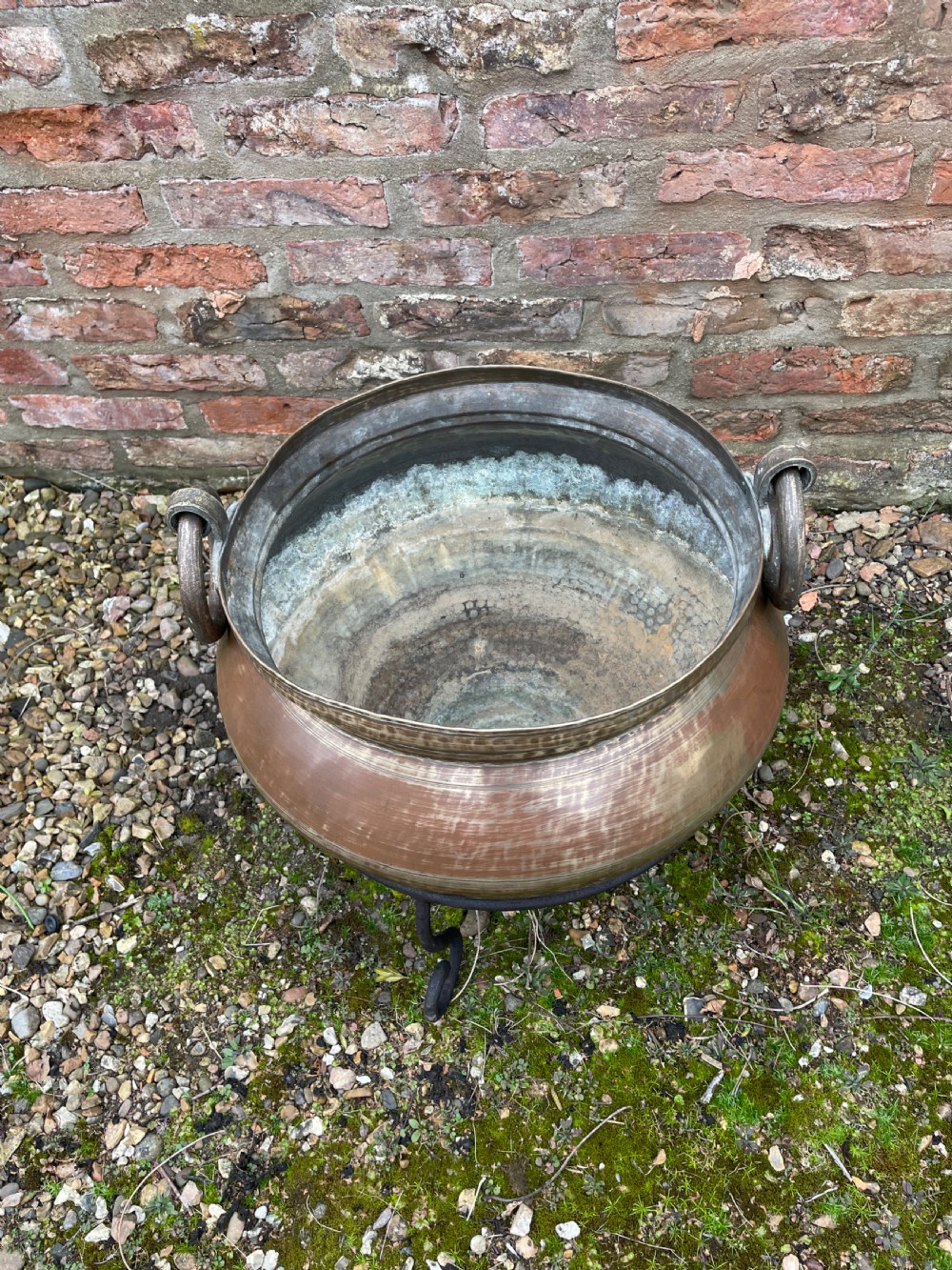 Oriental brass log bin on iron tripod stand circa 1920 View IV