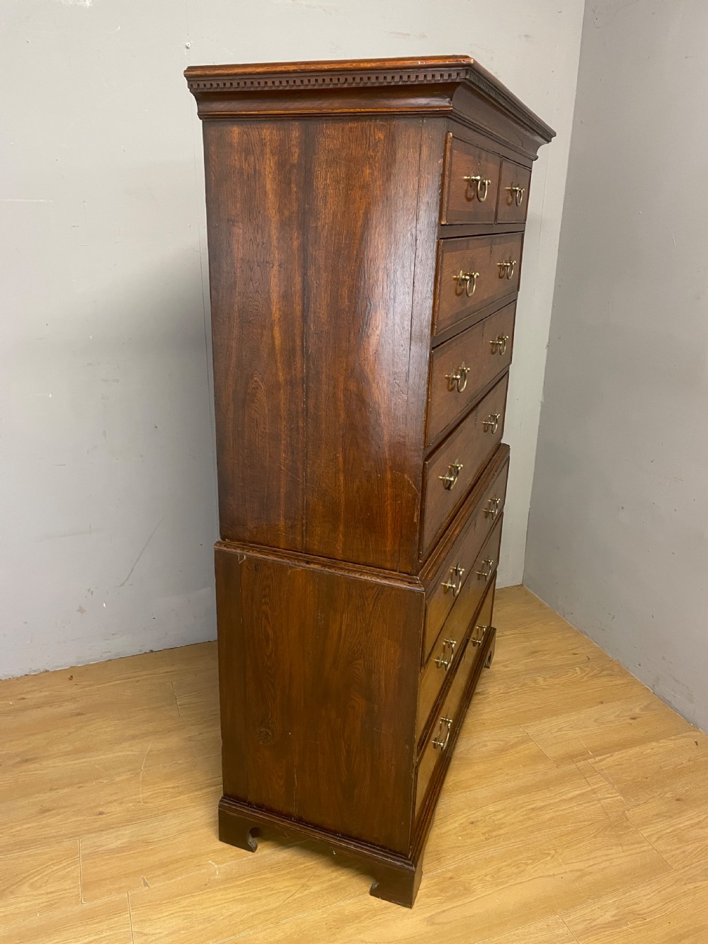 Georgian oak chest on chest with brass swan neck handles and mahogany cross banded drawers  View XI