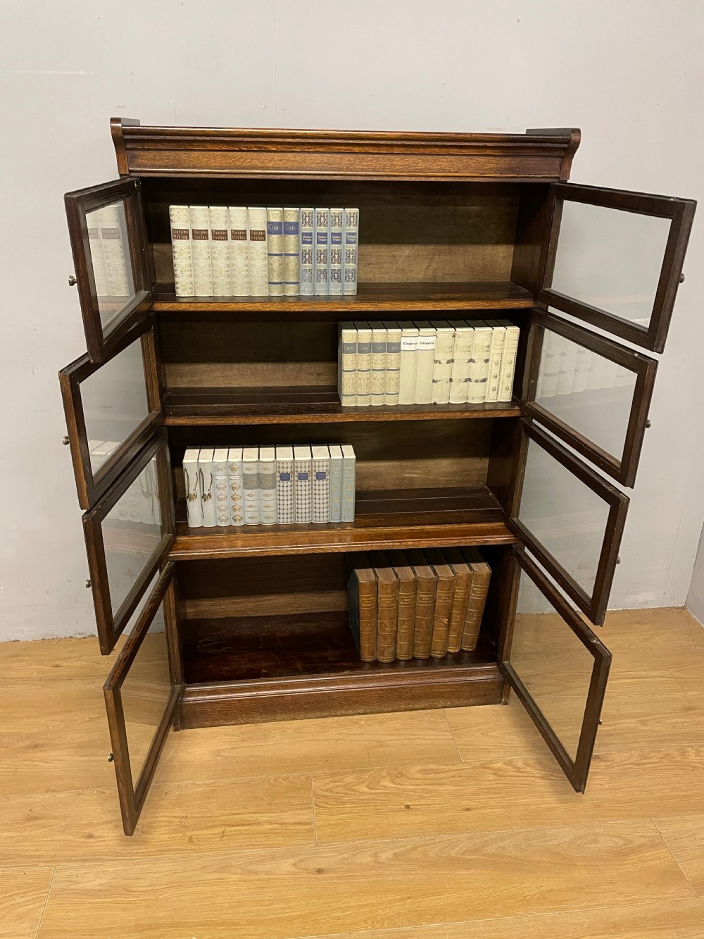 Edwardian oak sectional bookcase with glazed doors (by Minty of Oxford) View II