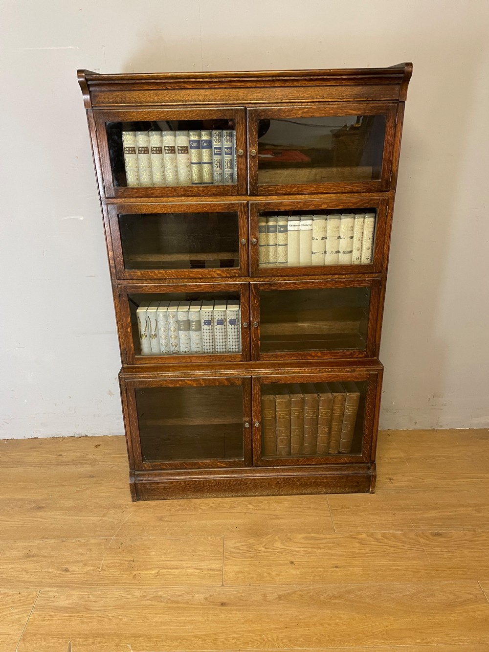 Edwardian oak sectional bookcase with glazed doors (by Minty of Oxford) View IV