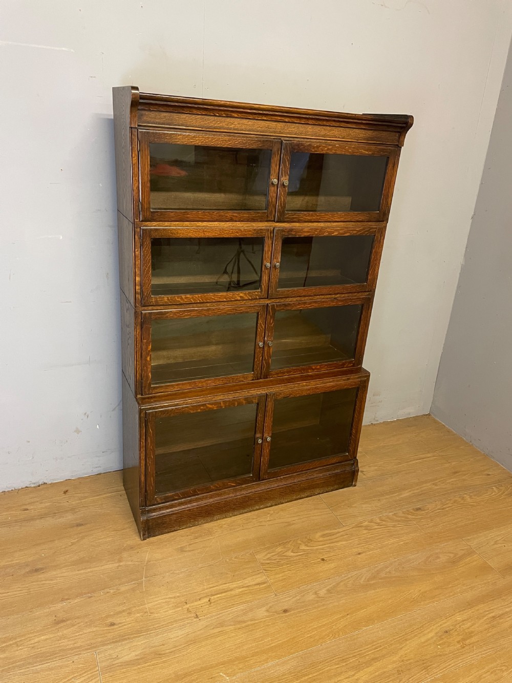 Edwardian oak sectional bookcase with glazed doors (by Minty of Oxford) View VI