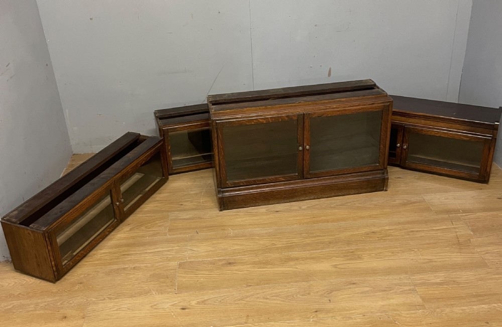Edwardian oak sectional bookcase with glazed doors (by Minty of Oxford) View XI