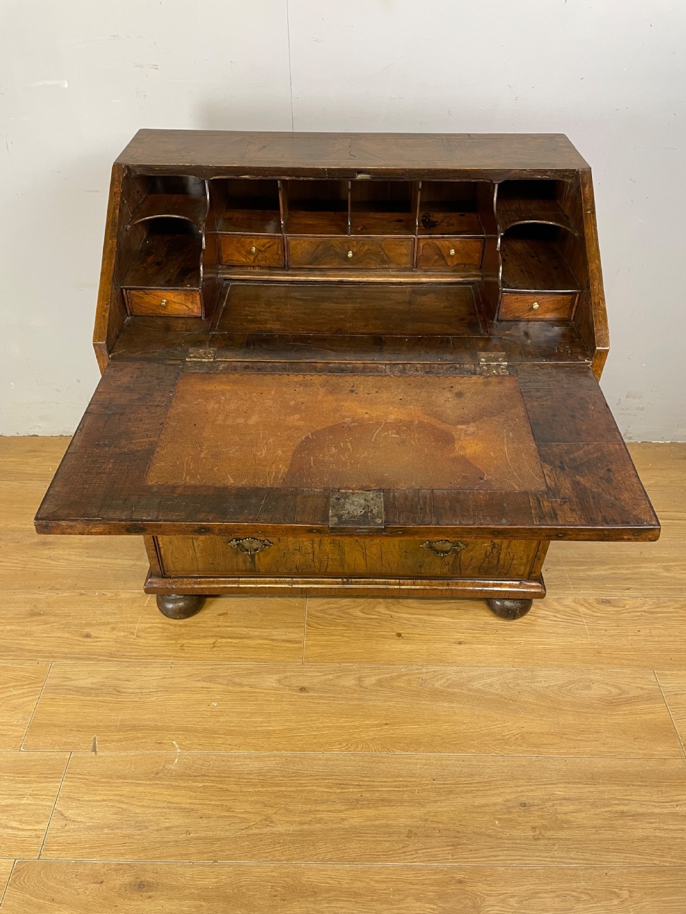 Early eighteenth century walnut bureau on original bun feet  View VI